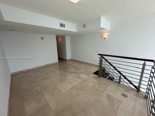 41 Southeast 5th Street, Unit 2112 Miami, FL 33131 - Photo 15 of 45 an empty room with windows