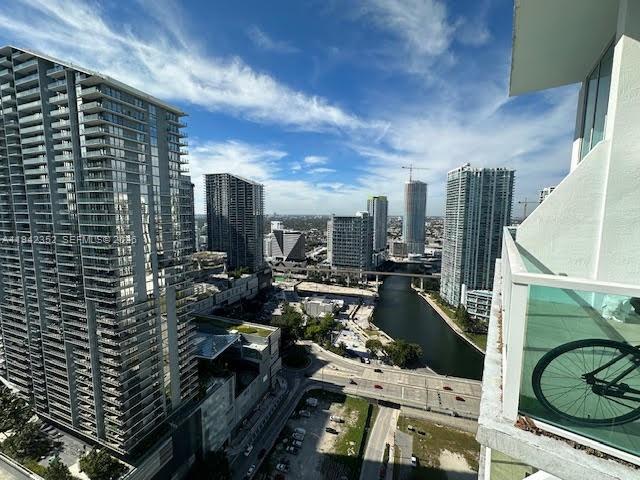 41 Southeast 5th Street, Unit 2112 Miami, FL 33131 - Photo 24 of 45 a view of gym equipment and potted plants