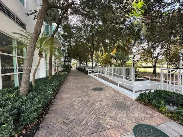 a city view with tall buildings and lake view