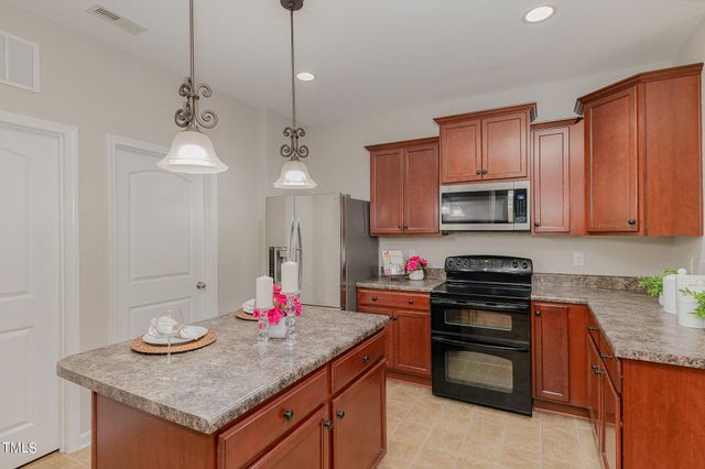 a bathroom with a sink a mirror and a toilet