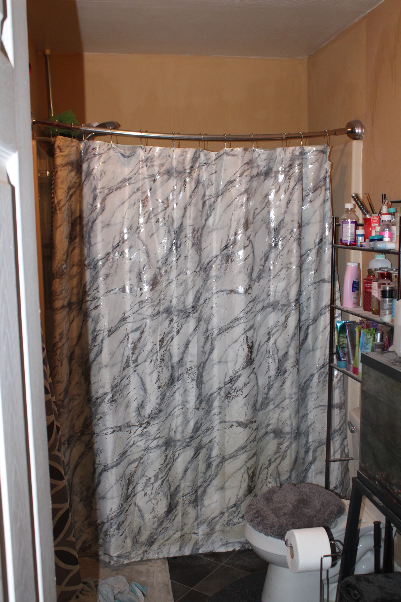 20 Cable Road Oak Grove, KY 42262 - Photo 10 of 12 a bathroom with a shower toilet and a sink