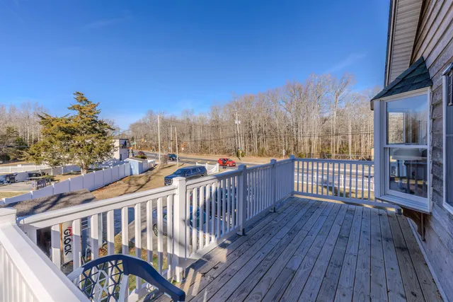 a view of roof deck with patio