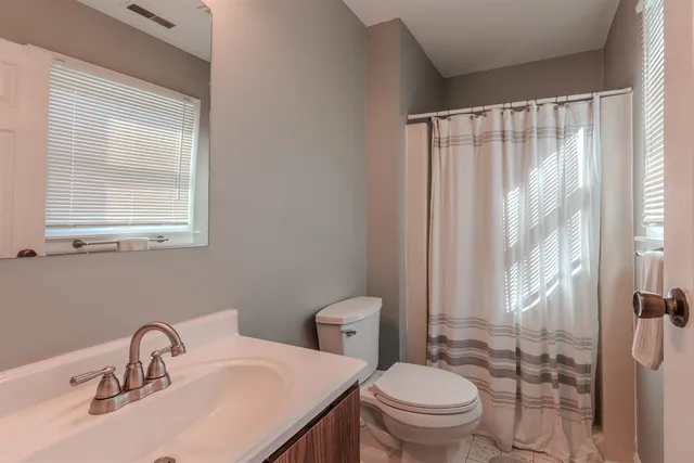 a view of a street with houses