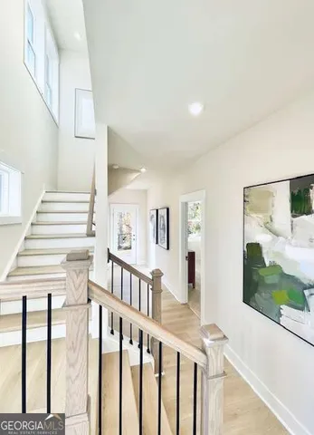 a view of a hallway with windows