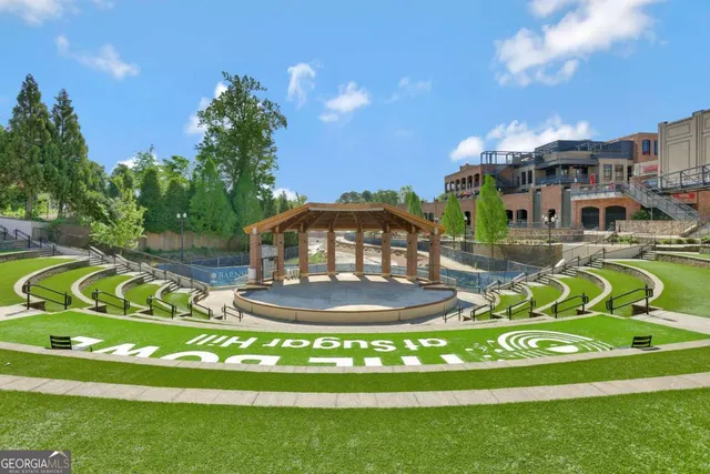 a view of swimming pool from a garden