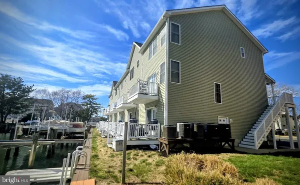 a front view of a house with swimming pool