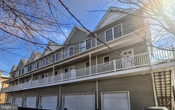 a view of ocean with city