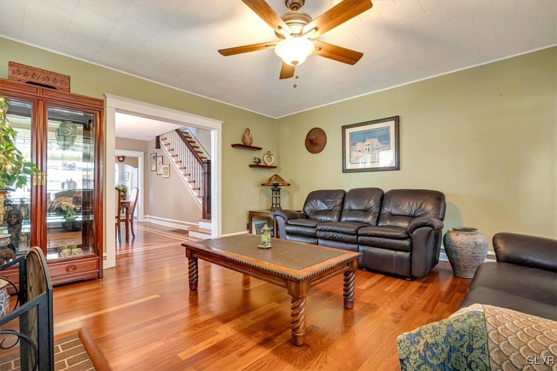 2107 Walbert Avenue Allentown, PA 18104 - Photo 11 of 55 a living room with furniture and a chandelier