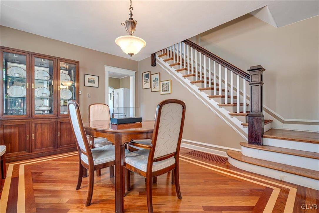 2107 Walbert Avenue Allentown, PA 18104 - Photo 12 of 55 a view of a dining room with furniture wooden floor and windows