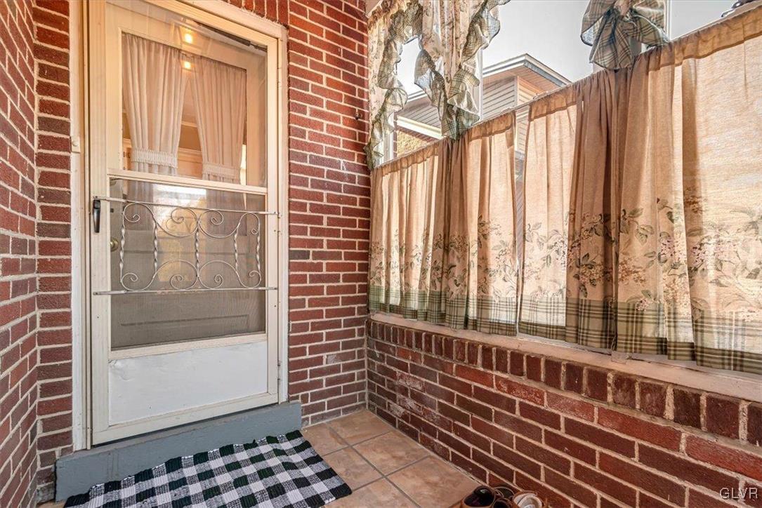 2107 Walbert Avenue Allentown, PA 18104 - Photo 24 of 55 a view of a large window with wooden floor