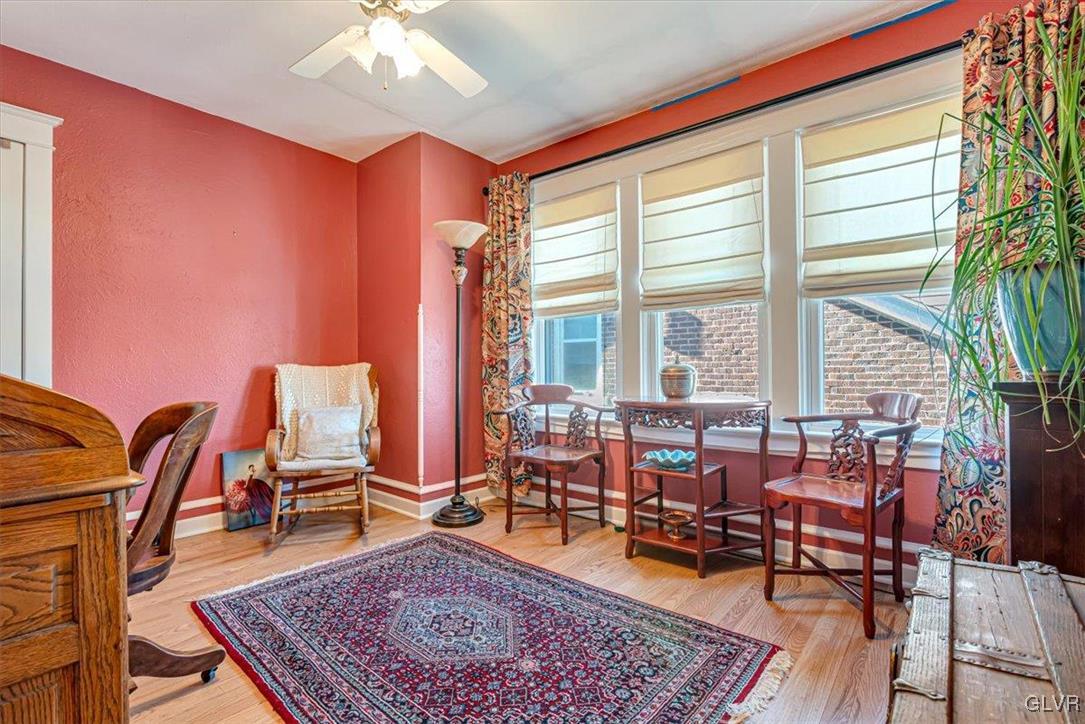 2107 Walbert Avenue Allentown, PA 18104 - Photo 30 of 55 a living room with furniture a rug and a large window