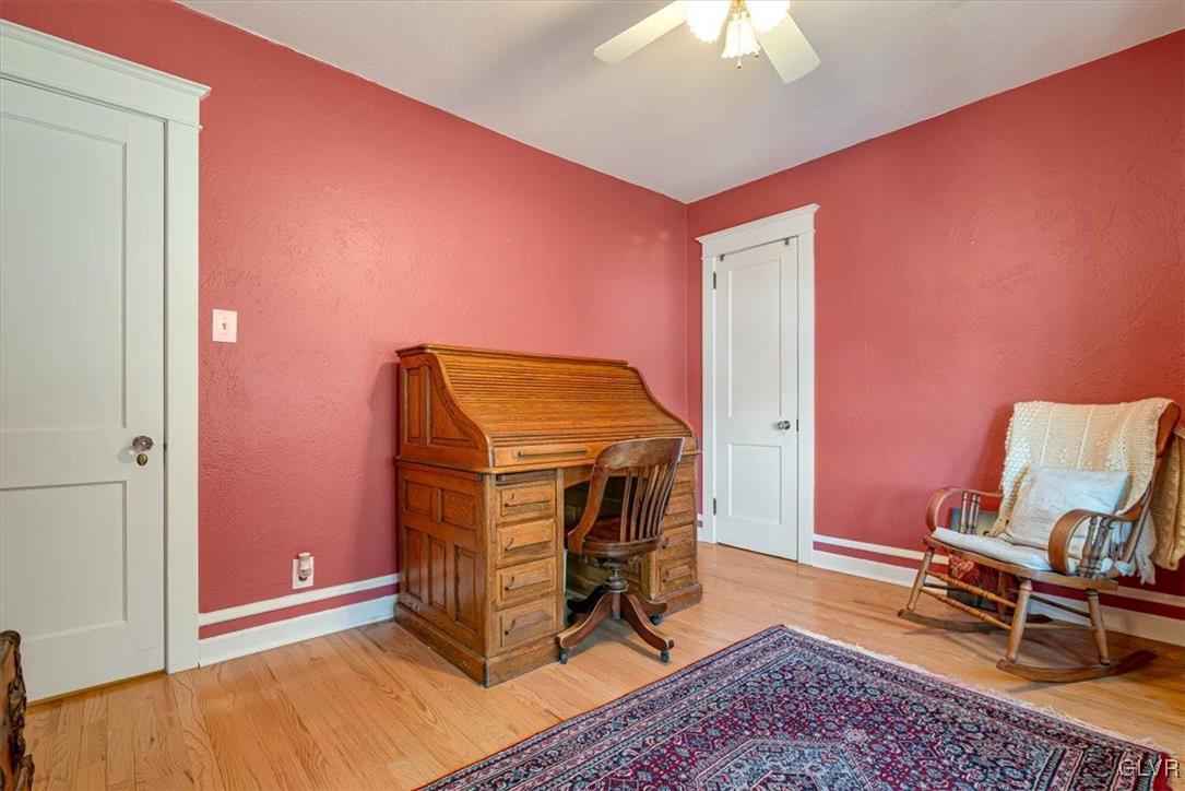 2107 Walbert Avenue Allentown, PA 18104 - Photo 31 of 55 a bedroom with a bed and a chandelier