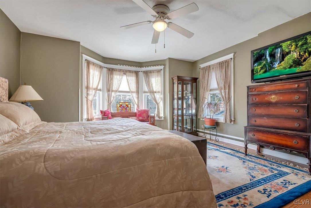 2107 Walbert Avenue Allentown, PA 18104 - Photo 33 of 55 a bed sitting in a bedroom next to a window