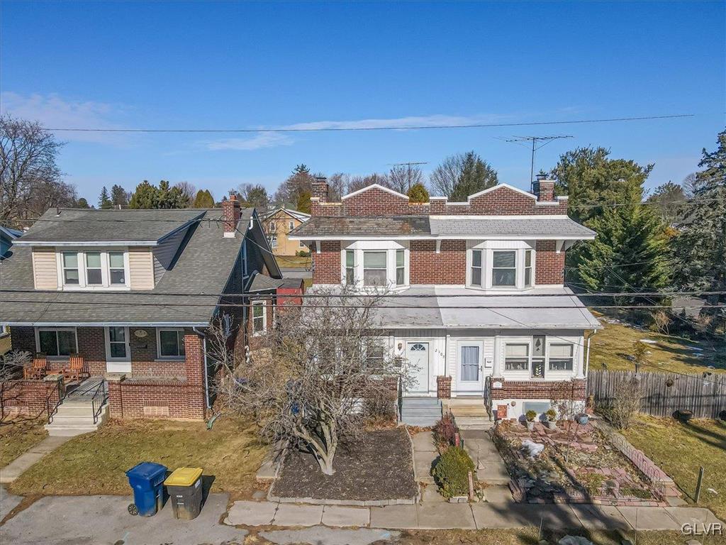 2107 Walbert Avenue Allentown, PA 18104 - Photo 51 of 55 a front view of a house with a yard