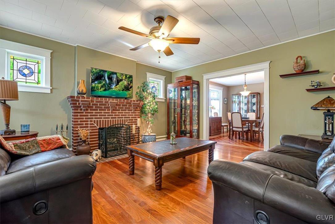 2107 Walbert Avenue Allentown, PA 18104 - Photo 8 of 55 a living room with furniture fireplace and a large window