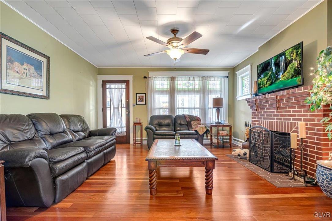 2107 Walbert Avenue Allentown, PA 18104 - Photo 9 of 55 a living room with fireplace furniture and a fireplace
