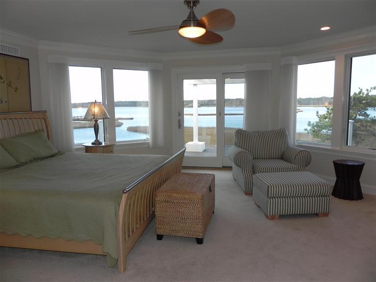 157 Monomoscoy Road Mashpee, MA 02649 - Photo 19 of 28 a living room with furniture and a large window