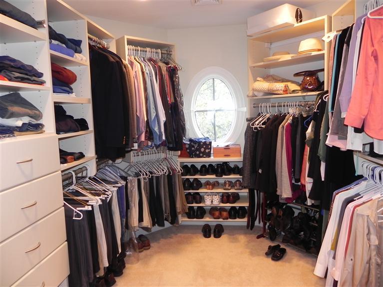 157 Monomoscoy Road Mashpee, MA 02649 - Photo 23 of 28 a view of walk in closet with clothes and shoes