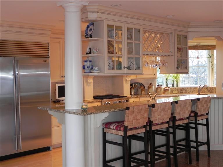 157 Monomoscoy Road Mashpee, MA 02649 - Photo 9 of 28 a table with chairs and window