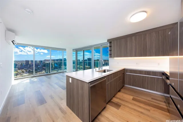 a kitchen with a stove and a sink