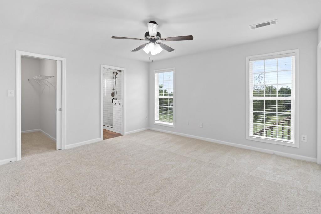 1214 Roxey Maxey Road Southwest Winder, GA 30680 - Photo 20 of 35 a view of an empty room with a window