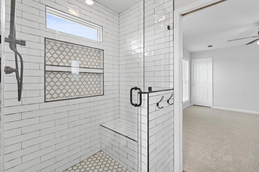 1214 Roxey Maxey Road Southwest Winder, GA 30680 - Photo 23 of 35 a bathroom with a shower