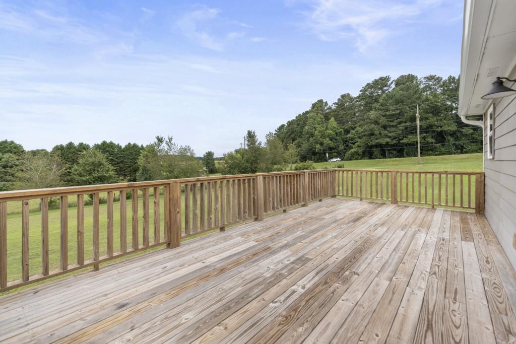 1214 Roxey Maxey Road Southwest Winder, GA 30680 - Photo 30 of 35 a view of a wooden deck