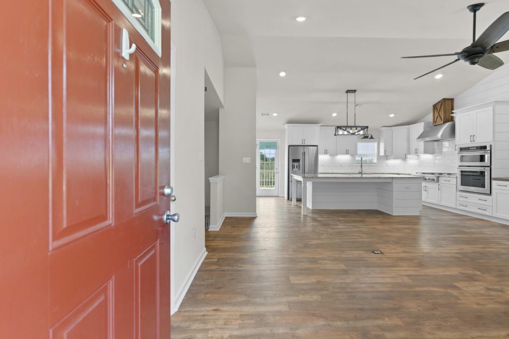 1214 Roxey Maxey Road Southwest Winder, GA 30680 - Photo 3 of 35 a view of a kitchen with a sink