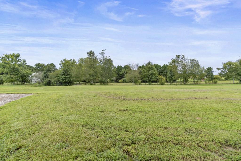 1214 Roxey Maxey Road Southwest Winder, GA 30680 - Photo 33 of 35 a view of a field with an ocean