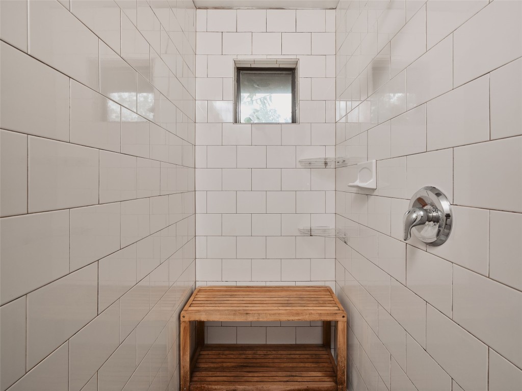 2002 East 13th Street, Unit A Austin, TX 78702 - Photo 30 of 37 Bathroom with tiled shower and a relaxing sauna