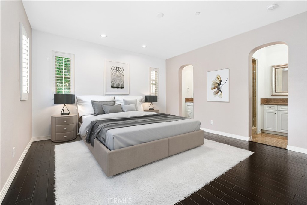 86 Townsend Irvine, CA 92620 - Photo 18 of 48 a bedroom with a large bed and wooden floor