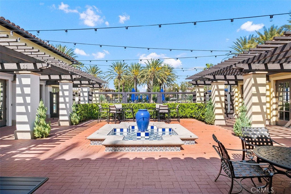 86 Townsend Irvine, CA 92620 - Photo 30 of 48 a view of a patio with a table and chairs