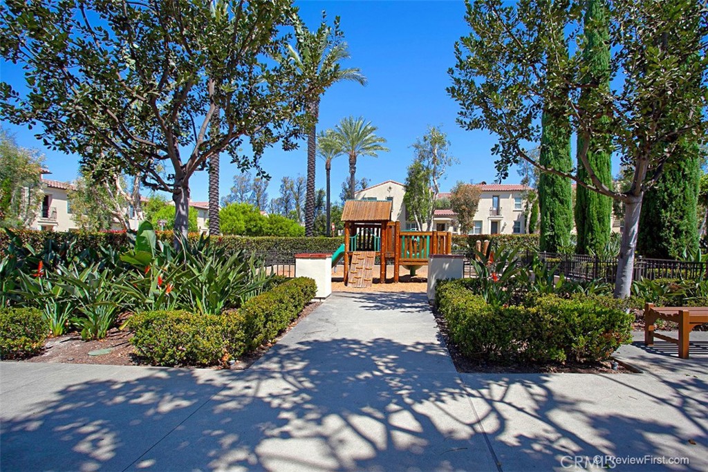 86 Townsend Irvine, CA 92620 - Photo 32 of 48 a view of a street with potted plants and large trees