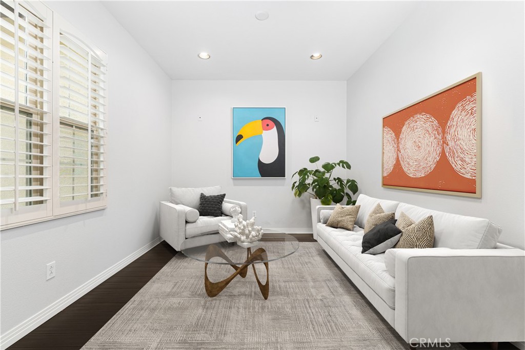 86 Townsend Irvine, CA 92620 - Photo 9 of 48 a living room with furniture and wall paintings