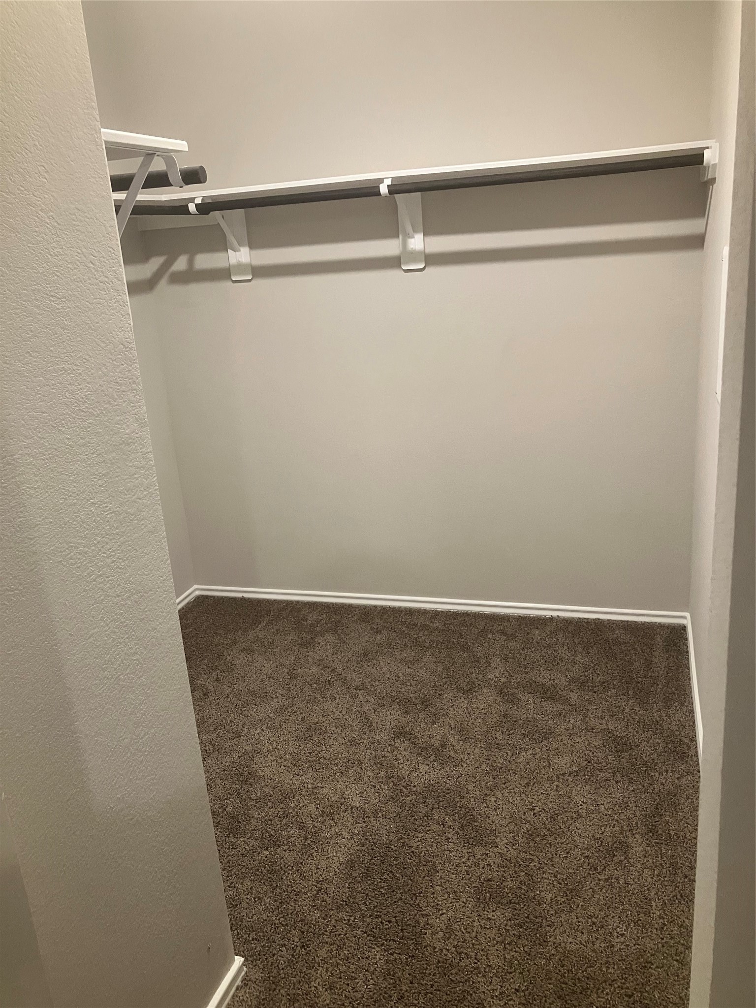 232 Blanco Drive Huntsville, TX 77340 - Photo 10 of 15 a view of a room with racks on the wall