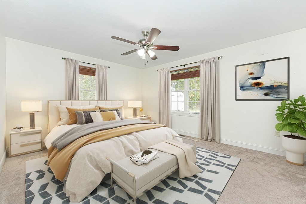 71 Snake Hill Road Ayer, MA 01432 - Photo 14 of 36 a bedroom with a bed and a window