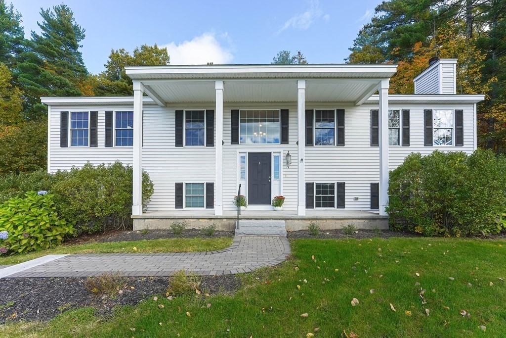 71 Snake Hill Road Ayer, MA 01432 - Photo 2 of 36 front view of a house with a yard