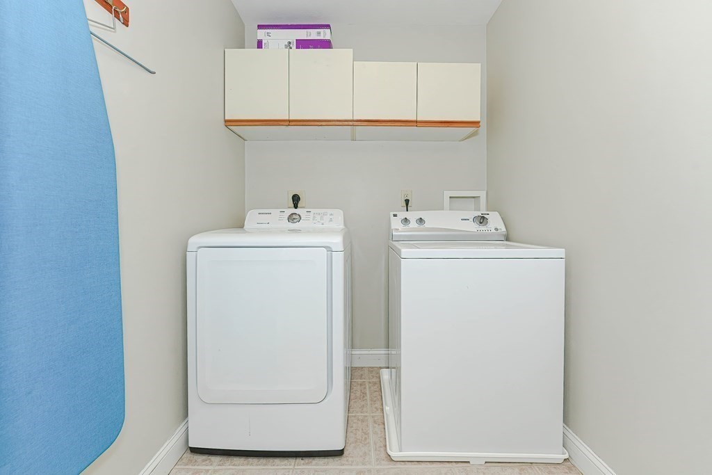 71 Snake Hill Road Ayer, MA 01432 - Photo 25 of 36 a utility room with dryer and washer