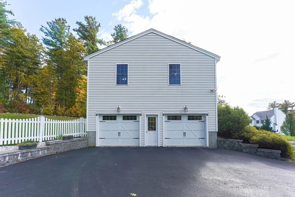 71 Snake Hill Road Ayer, MA 01432 - Photo 36 of 36 a view of a house with a yard