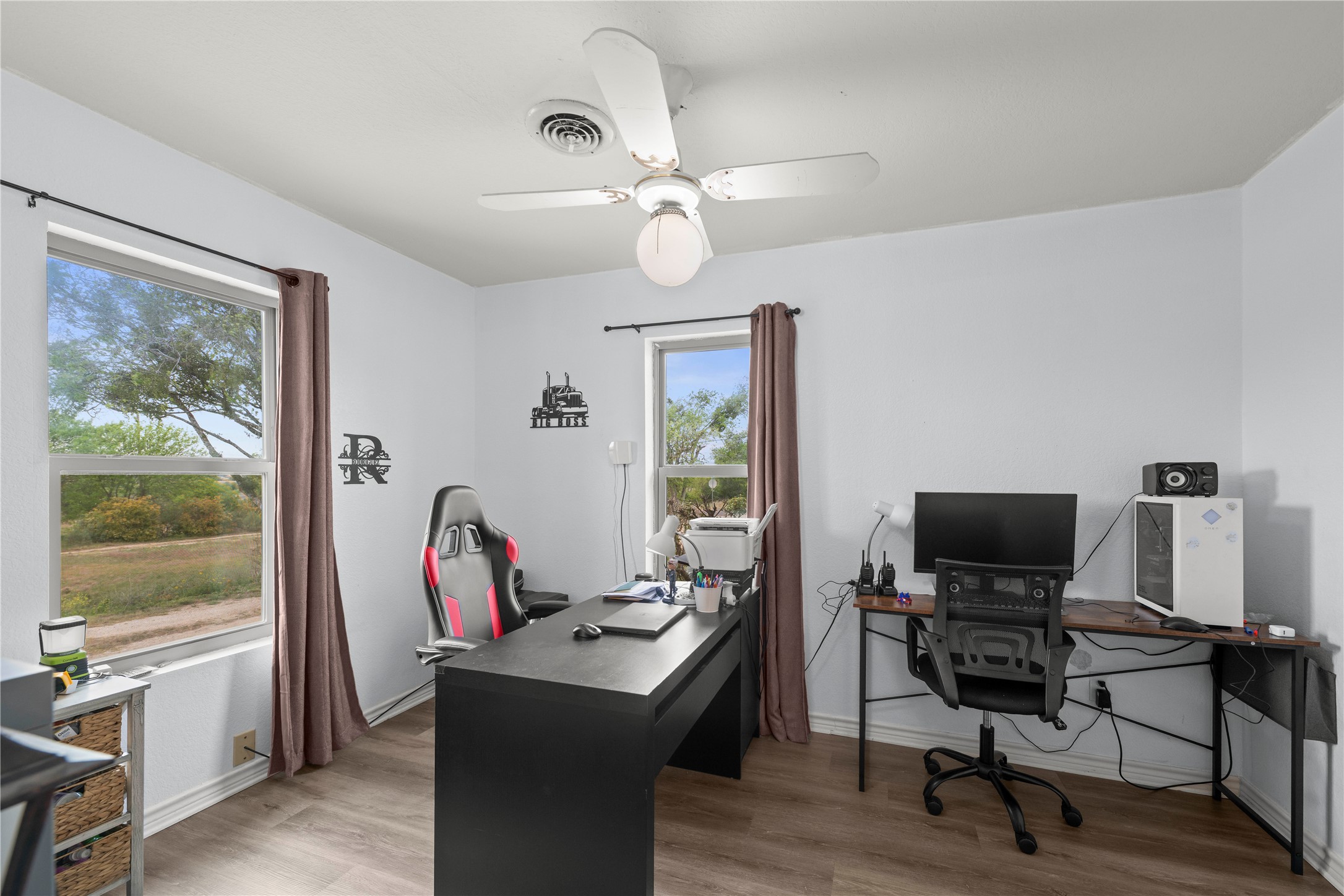 2915 County Road 153 Georgetown, TX 78626 - Photo 11 of 24 a view of a workspace with furniture and a window