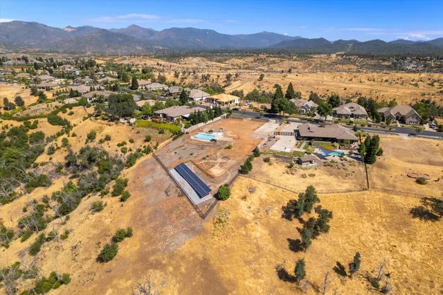 an aerial view of residential building with outdoor space