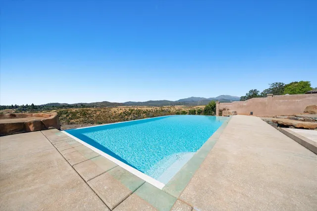 a view of swimming pool with a terrace
