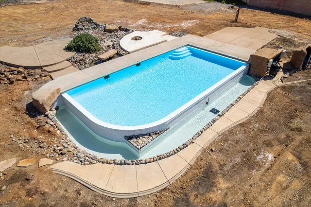 a view of a terrace with a lake view
