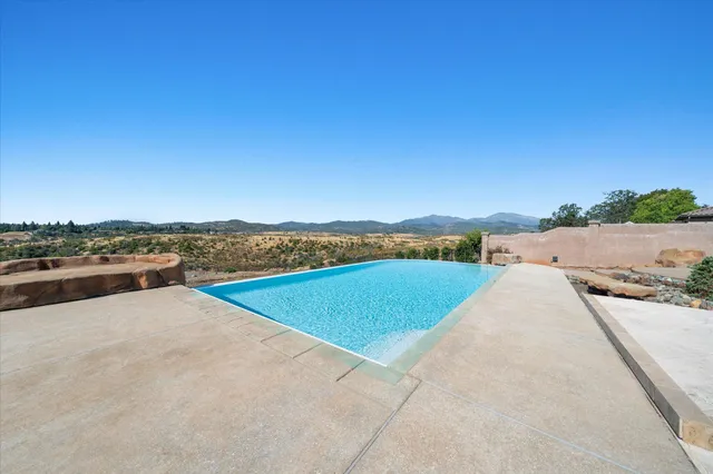 a view of a city with mountains in the background