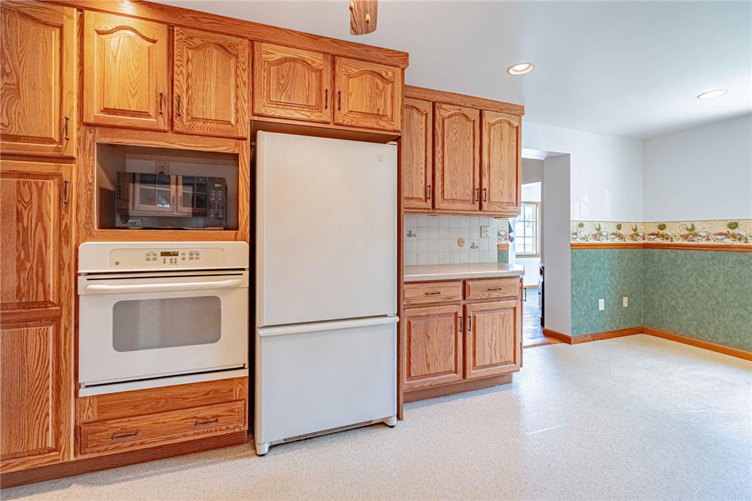 4165 East Texas Road Allentown, PA 18103 - Photo 21 of 56 Functional kitchen offers ample storage within wooden cabinetry and built-in appliances.