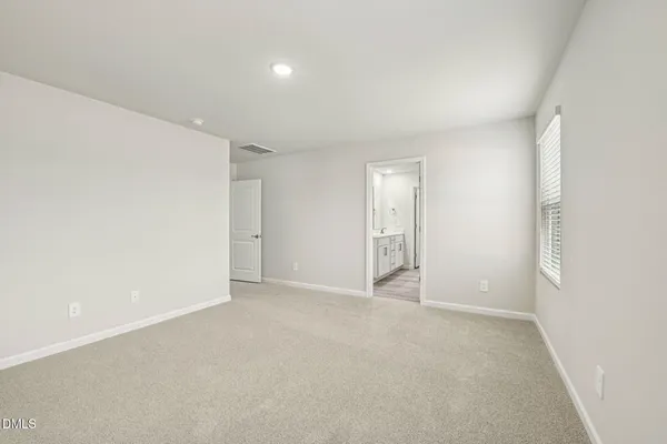 an empty room with an entryway