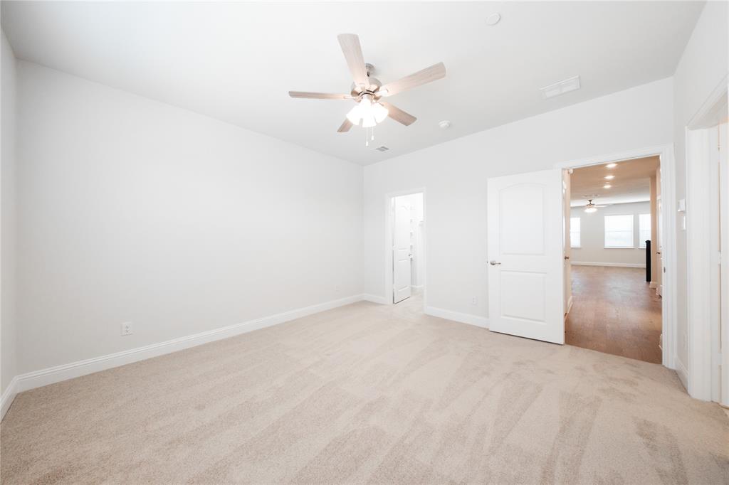 7929 Sunset Boulevard Rowlett, TX 75088 - Photo 10 of 34 Primary Bedroom