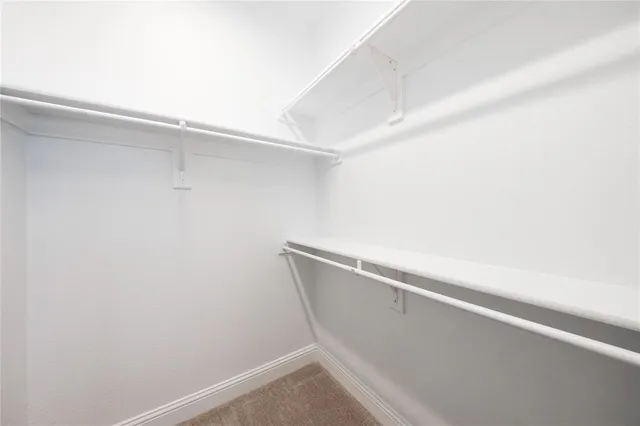 a view of small space with racks on the wall