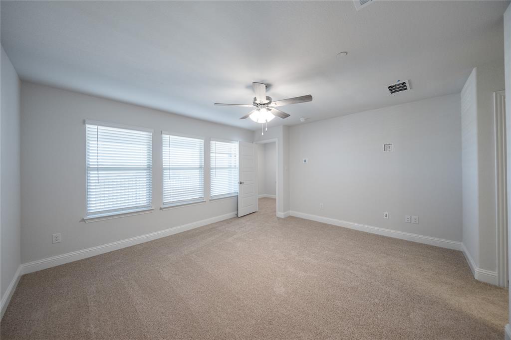 7929 Sunset Boulevard Rowlett, TX 75088 - Photo 21 of 32 a view of an empty room with a window