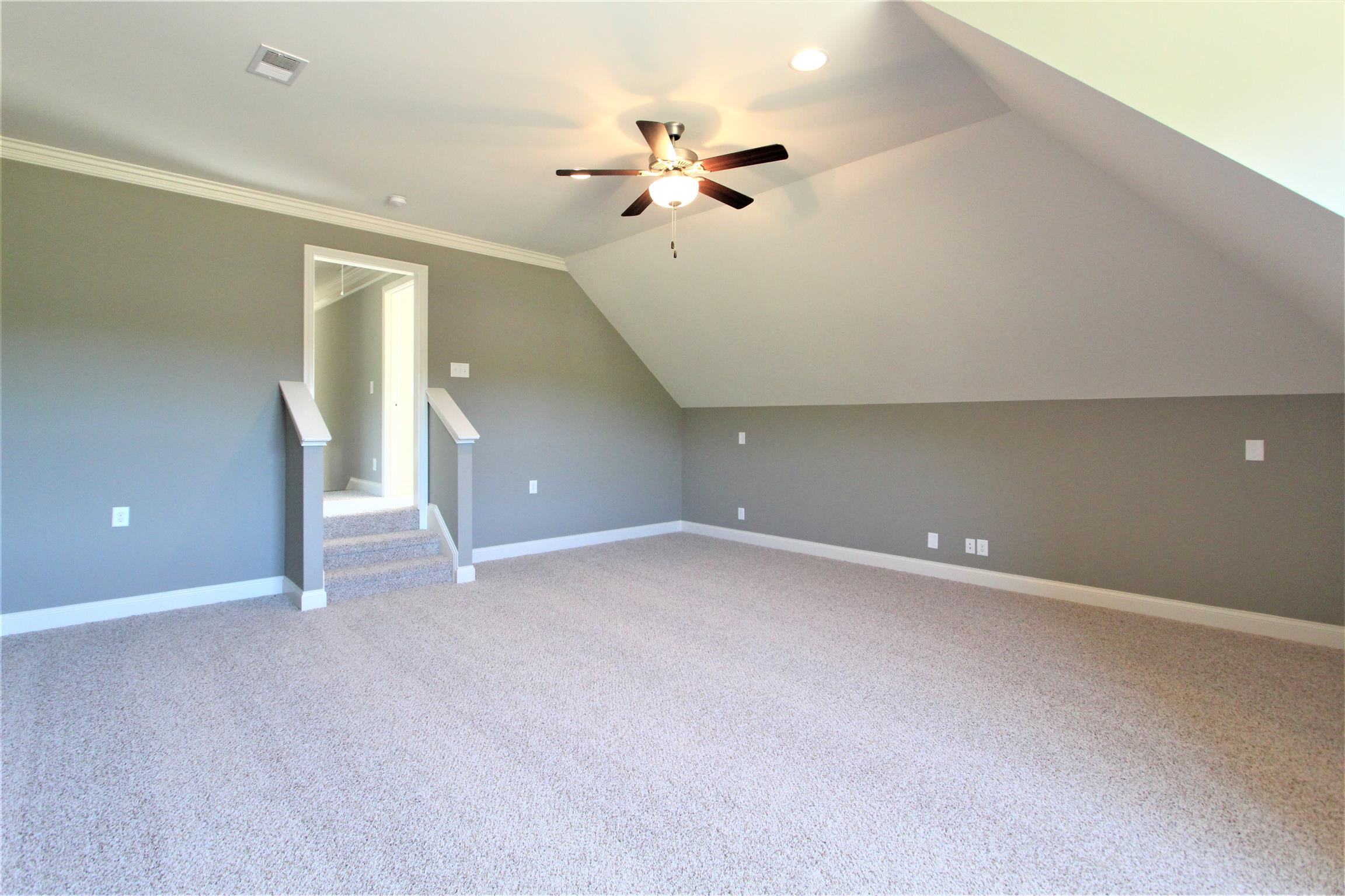 3818 Old Murfreesboro Road West, Unit 5 Lebanon, TN 37090 - Photo 24 of 27 a view of an empty room with a ceiling fan